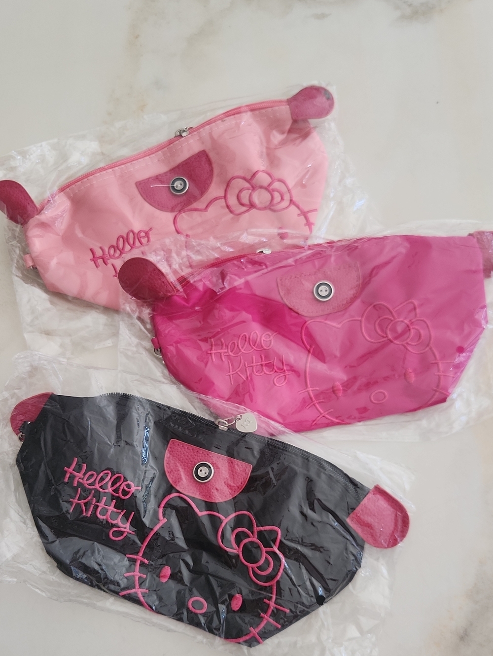 Hello Kitty Wrislet Or Cosmetic Bags..Pick Your Color!